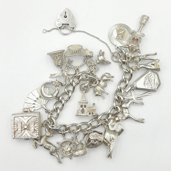 Silver charm bracelet with on sale charms